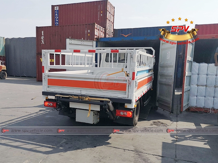 Cargo Truck with Tailgate Lift - Loading into Container